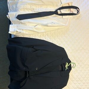 Boys navy suit and pants with tie and shirt like new